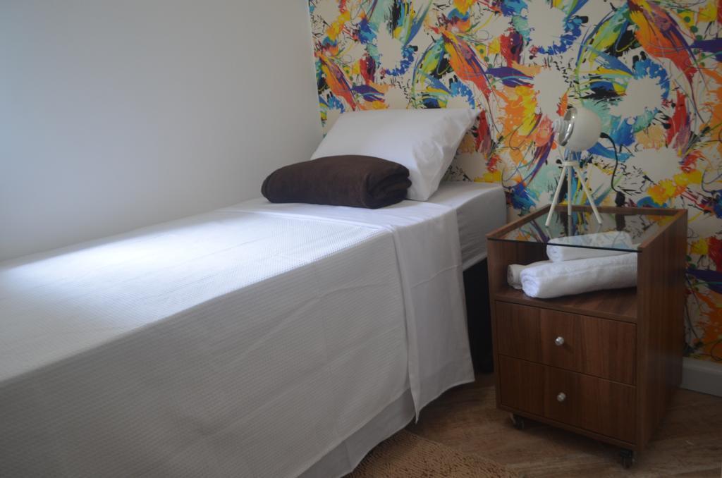 Quarto Individual com Casa de Banho Partilhada